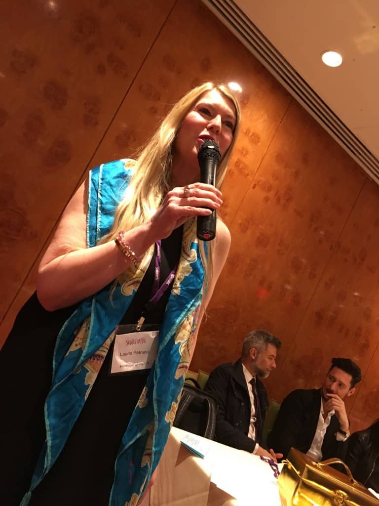 Laurie Petrucci presenting L'arganique. Associazione Caterina's Riccardo Tedeschi and Alessandro Brun listening in background